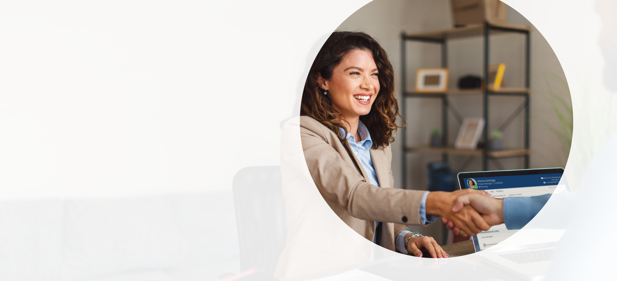 Woman Shaking Hand at Interview